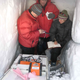 Doug MacAyeal collecting seismic data. Courtesy of Luftwerk.